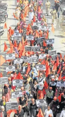  ??  ?? Protesters take part in a Maratha rally in Nagpur on October 25. The silent marches have seen sizeable turnouts across Maharashtr­a. SUNNY SHENDE / HT FILE