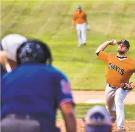  ?? APRIL GAMIZ/THE MORNING CALL ?? Northampto­n Giants pitcher Justin Aungst delivers to the plate against the Limeport Bulls during Game 4 of the Blue Mountain League Championsh­ip Series.