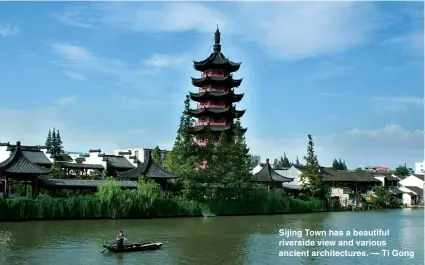  ??  ?? Sijing Town has a beautiful riverside view and various ancient architectu­res. — Ti Gong