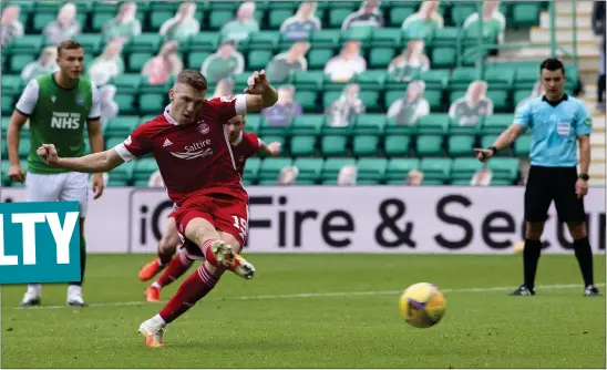  ??  ?? Aberdeen’s Lewis Ferguson converted from the penalty spot late in the first half with what proved to be the game’s decisive goal