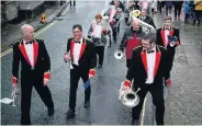  ?? CHRISTOPHE­R FURLONG/GETTY ?? Flookburgh Band in the village of Delph