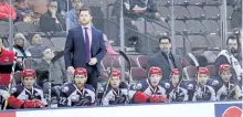  ?? SARAH HOBDAY/SPECIAL TO THE EXAMINER ?? New Peterborou­gh Petes assistant coach Mike Duco is seen behind the bench of the ECHL's Elmira Jackals.