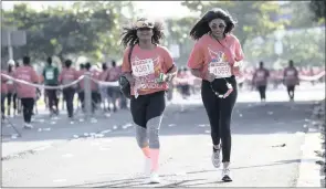  ??  ?? Tyvia Naidoo and Kimone Naidoo taking part in the Spar Women’s Race in Durban.