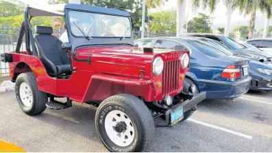  ?? PHOTOS BY KAREEM LATOUCHE ?? A red Willy Jeep stands ready to conquer any terrain.