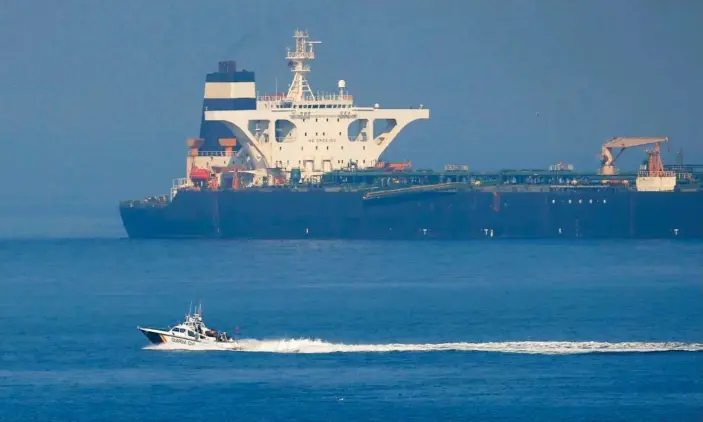  ?? Photograph: Jon Nazca/Reuters ?? The Iranian oil tanker Grace 1 at anchor after it was seized by British Royal Marines in the strait of Gibraltar in July.