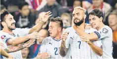  ?? — Reuters photo ?? Italy’s Simone Zaza (second right) celebrates with his teammates after scoring against Norway during their Euro 2016 qualifying match at Ullevaal Stadium in Oslo.