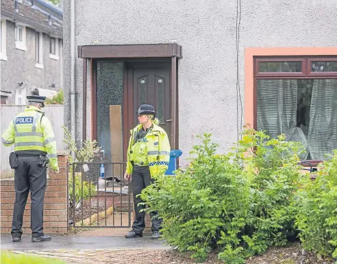  ?? Picture: Steven Brown. ?? Police at the Glenrothes property yesterday, a developmen­t that prompted Mr Bryant Sr to say: “I just hope that something comes from it.”