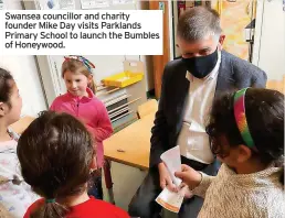  ?? ?? Swansea councillor and charity founder Mike Day visits Parklands Primary School to launch the Bumbles of Honeywood.