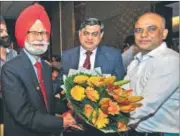  ??  ?? Hockey Olympian Balbir Singh (left) being greeted by bureaucrat K K Khandelwal and sports editor Saurabh Duggal