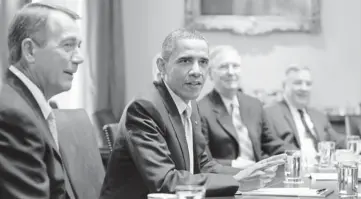  ?? CHARLES DHARAPAK, AP ?? President Obama meets in 2011 with House Speaker John Boehner, left, and others at the White House.