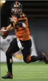  ?? CANADIAN PRESS FILE PHOTO ?? In two games, Travis Lulay has passed for 840 yards and five touchdowns.