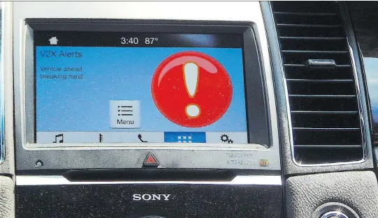  ?? BRIAN HARPER ?? Ford’s Cellular Vehicle to Everything (C-V2X) system will, among other things, warn motorists of dangerous situations ahead of them.