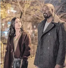  ?? COURTESY OF MARVEL, NETFLIX ?? Rosario Dawson and Mike Colter star in Marvel/Netflix’s “Luke Cage.”