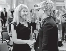  ?? [THE OKLAHOMAN ARCHIVES] ?? Sue Ann Arnall, left, shakes hands after a news conference in the lobby of City Hall in 2018. Arnall is president of the Arnall Family Foundation.