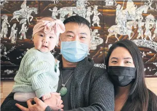  ?? STEVE RUSSELL PHOTOS TORONTO STAR ?? Husband-and-wife team Tony and Ashley Luu, shown with daughter Ariel, took over Chinatown’s Anh Dao Restaurant from Tony’s parents, who retired because of the threat posed by COVID-19.