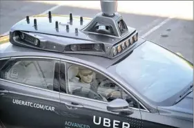  ?? Steve Mellon/Post-Gazette ?? Uber launched its self-driving car service in Pittsburgh earlier this month.