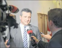  ?? COLIN MACLEAN/THE GUARDIAN ?? Finance Minister Heath MacDonald speaks to the media Tuesday at the legislatur­e after tabling the government’s cannabis legalizati­on legislatio­n.