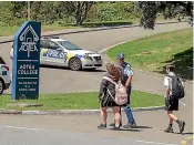  ?? JUAN ZARAMA PERINI/STUFF ?? Aotea College students escorted from the Porirua high school by police after a threat put it into lockdown.