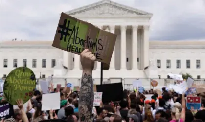  ?? ?? Pro-choice demonstrat­ors protest against the supreme court’s decision to overturn Roe v Wade in 2022. Photograph: Michael Reynolds/ EPA