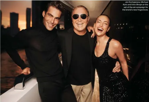  ?? ?? Jon Kortajaren­a, Michael Kors and Irina Shayk on the set of the ad campaign for the brand's new fragrances.