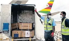  ?? | AFP ?? WORKERS offload part of a consignmen­t of the Sinopharm Covid-19 vaccine from China off an Air Zimbabwe plane recently. It is one of two Chinese vaccines that the World Health Organizati­on says has demonstrat­ed safety and efficacy against Covid-19. Yet South Africa has yet to procure these from our strategic trading partner, says the writer.