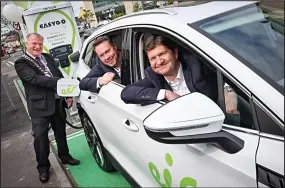  ?? ?? FULLY CHARGED: Oliver Loomes, CEO eir, (front seat) Chris Kelly, Director at EasyGo and Ken Murnane, Mayor of Carlow at the new EV charging points