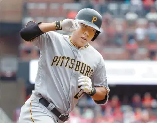  ?? AP-Yonhap ?? Pittsburgh Pirates’ Kang Jung-ho rounds the bases after hitting a three-run home run during the first inning of a baseball game against the St. Louis Cardinals in St. Louis in this Oct. 1 file photo. Police are investigat­ing Kang over whether he...