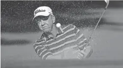  ?? ROB SCHUMACHER/THE REPUBLIC ?? Billy Mayfair blasts out of a bunker during the 2017 Charles Schwab Cup Championsh­ip at Phoenix Country Club.