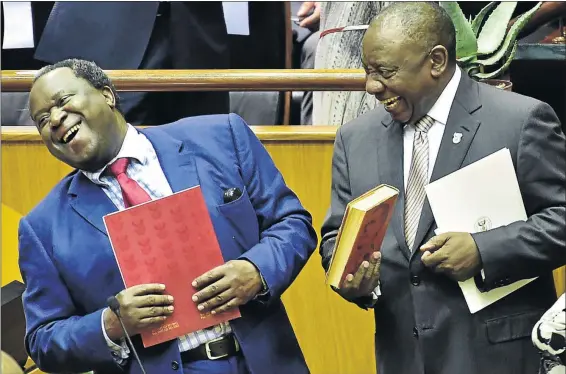  ?? /ELMOND JIYANE/ GCIS ?? Finance minister Tito Mboweni, who was presenting his 2019 budget speech, shares a light moment with President Cyril Ramaphosa during the plenary of the National Assembly in Cape Town yesterday.