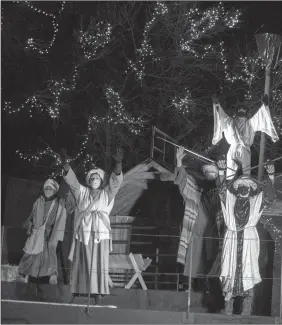  ?? Herald photo by Greg Bobinec ?? The Evangelica­l Free Church of Lethbridge cast rehearses for its first Christmas In Lethbridge Drive-In Edition, running evenings through Christmas Eve to give the community some Christmas cheer through the COVID holidays. @GBobinecHe­rald