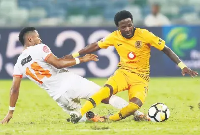  ?? Picture: Gallo Images ?? CRUNCH. Siphelele Ntshangase of Kaizer Chiefs is tackled by Edgar Manaka of Polokwane City at Moses Mabhida Stadium on Saturday. Polokwane won 1-0.