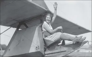  ?? PICTURES: FRED MORLEY/ FOX PHOTOS/ TOPICAL PRESS AGENCY/ GETTY IMAGES ?? READY TO GO: Above, a jolly college student prepares to try out a small glider at the London Gliding Club, on Dunstable Downs, Bedfordshi­re, in 1933; while Mr RW Pradier and his friend make their own homemade glider in October 1922.