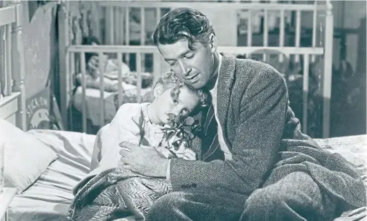  ?? ?? CLASSIC WEEPY: Karolyn Grimes and James Stewart starred in the 1946 Christmas fantasy drama, It’s A Wonderful Life.