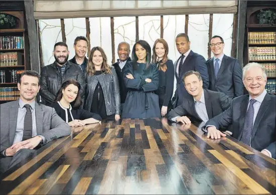  ?? Jay L. Clendenin Los Angeles Times ?? THE CAST OF ABC’s “Scandal,” led by Kerry Washington, center, on the Olivia Pope & Associates set during the final week of filming. The series ends on Thursday.