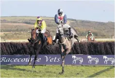  ??  ?? Fergus Gregory on board Vocaliser (left) on their way to winning the Yorton & Potter Group Stallions Conditiona­l Jockeys’ Handicap Chase at Ffos Las on Sunday.