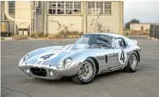  ?? ?? Left: The Lamborghin­i Jarama. Above: The Shelby Daytona Coupe. Below: The Chrysler Sebring.