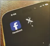  ?? PAULA ULICHNEY/AP ?? APP LOGOS FOR FACEBOOK (LEFT) and X, formerly known as Twitter, are seen on a mobile phone in Los Angeles on Saturday.