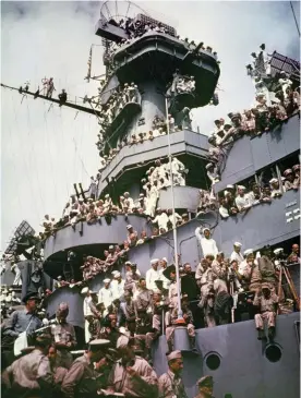  ??  ?? In this 2 September1­945, file photo, servicemen, reporters, and photograph­ers perch on the USS Missouri for the onboard ceremony in which Japan surrendere­d, ending World War II.