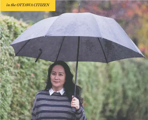  ?? JONATHAN HAYWARD / THE CANADIAN PRESS ?? Meng Wanzhou leaves her home in Vancouver on Monday. Several Canadian MPs have taken up the cause of the millionair­e Huawei chief financial officer — with no mention of the two Canadians being held indefinite­ly in Chinese lockup.