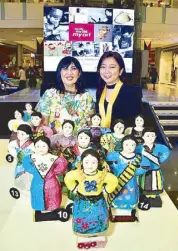  ??  ?? SM SVP for marketing Millie Dizon and Philippine STAR advertisin­g manager Grace Laurel admire the higantitos made by students in the art workshop.