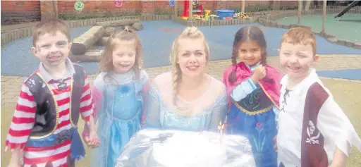  ??  ?? ●●Gemma Blades as Princess Elsa with (left to right) James Muldoon, Evie Wareing, Anieka Cobley-Francis and Leon Fleming at Happy Day Nursery