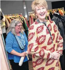  ?? [PHOTO BY K.T. KING, FOR UCO] ?? Above: Kaye Sears, head of the University of Central Oklahoma’s Human Environmen­tal Sciences Department, models a 1960s sequined coat as Mary Huffman, left, looks on.