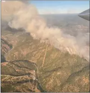  ?? COURTESY PHOTO ?? The Rices Fire burns along the Yuba River in Nevada County on Tuesday. The wildfire was 22% contained as of 7 a.m. Friday.