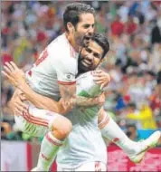  ?? REUTERS ?? Diego Costa (right) celebrates after scoring Spain’s matchwinne­r against Iran on Wednesday.