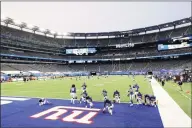  ?? Al Bello / Getty Images ?? The Giants warm up before a Sept. 14 game against the Steelers at MetLife Stadium in East Rutherford, N.J.