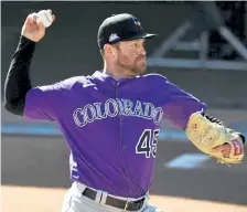  ?? Andy Cross, The Denver Post ?? Rockies pitcher Scott Oberg works out in February at Salt River Fields at Talking Stick in Scottsdale, Ariz.