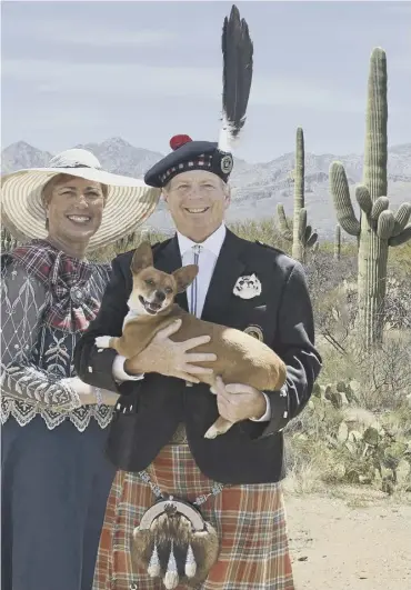  ?? ?? 0 Richard Mcbain with partner Lisa Macfarlane and pet Rex surrounded by cacti in Arizona