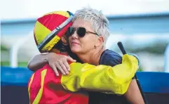  ??  ?? DELIGHTFUL WIN: Trainer Tracy Simmons and jockey Wanderson D'Avila after Shoreline’s triumph yesterday.