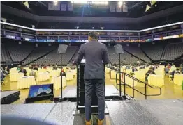  ?? RICH PEDRONCELL­I AP ?? Assembly Speaker Anthony Rendon addresses Assembly members during an organizati­onal session Monday at the Golden 1 Center in Sacramento.