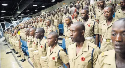  ?? FILE ?? In this 2019 photo National Service Corps members are seen at the End of Programme ceremony. Horace Chang writes: ... programmes such as the Jamaica National Service Corps ... aim to equip young people with skills, emotional support, and formal education to break the cycle of vulnerabil­ity.